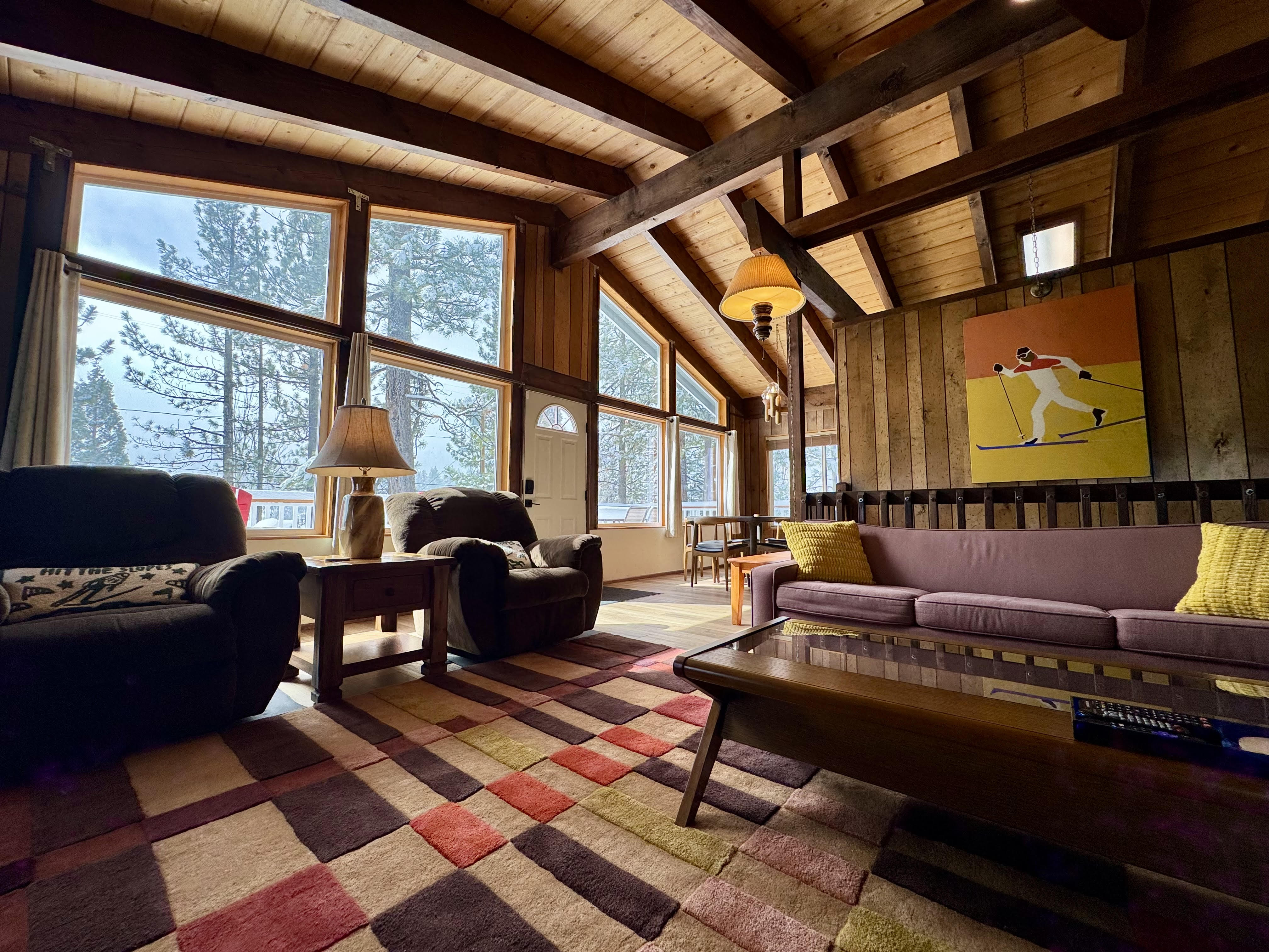 Cabin living room with vaulted ceiling at Bear View Escape