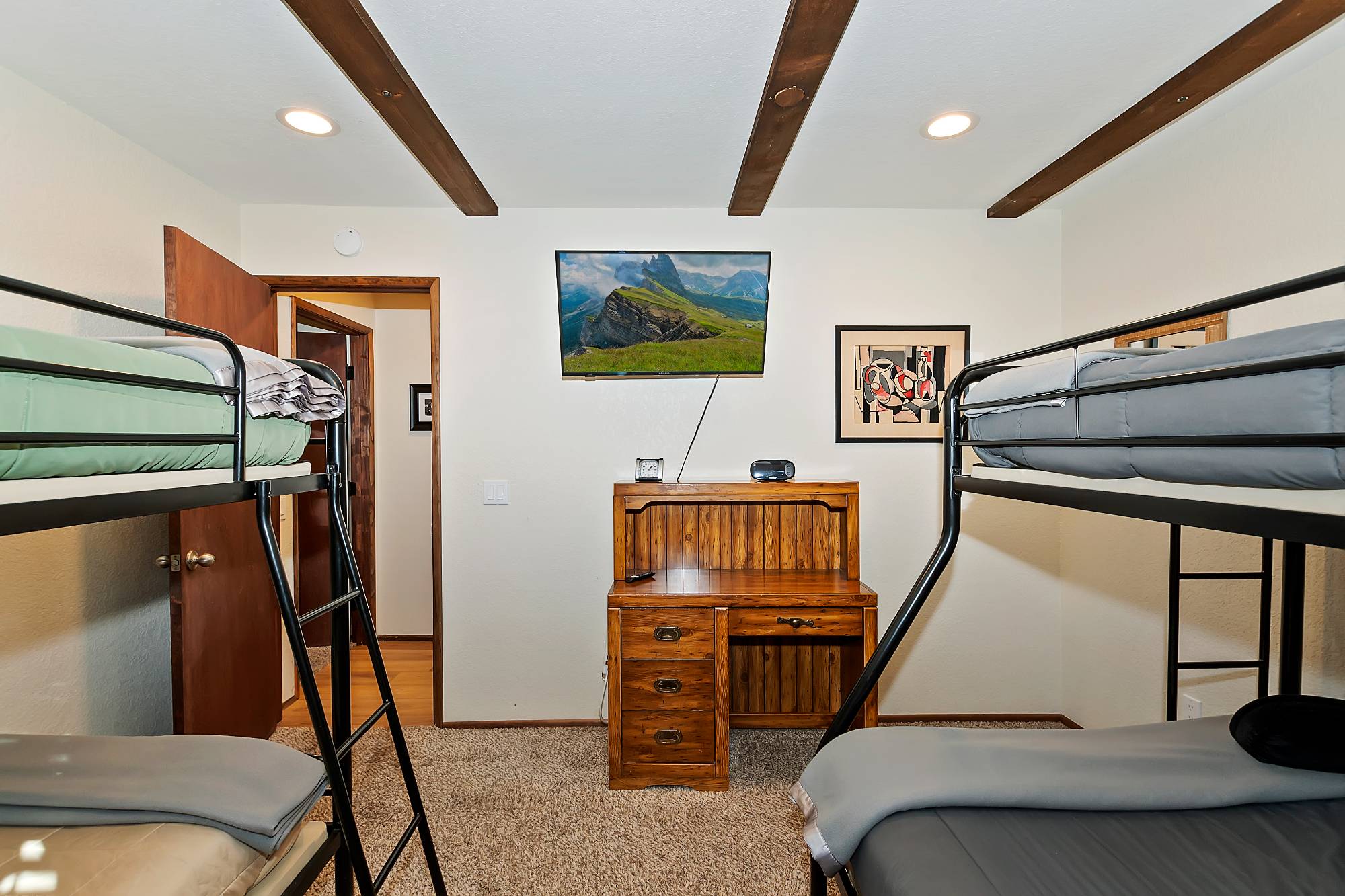 Bunk room with twin over full and twin over twin bunk beds at Bear View Escape in Big Bear Lake